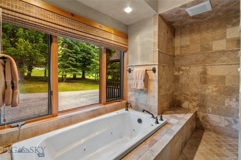 2640 Rain In Face Road, Big Sky MT 59716